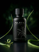 Black bottle of Aura Wellness lemongrass product with green leaves on a dark background
